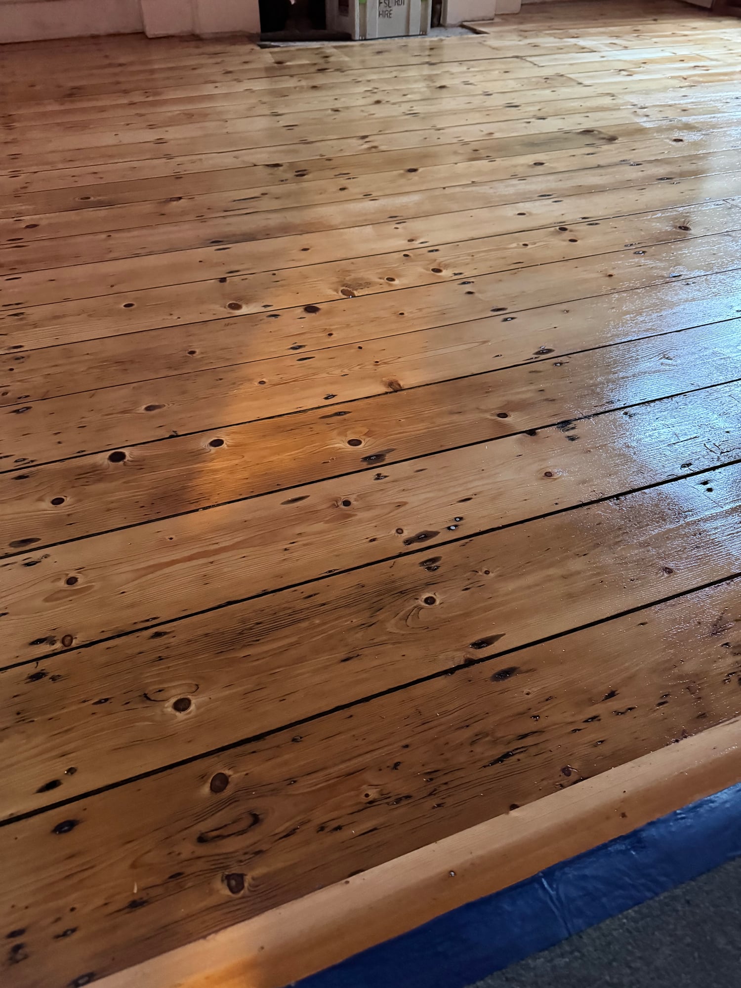 Sanded and sealed pine floorboards in a Chelsea property