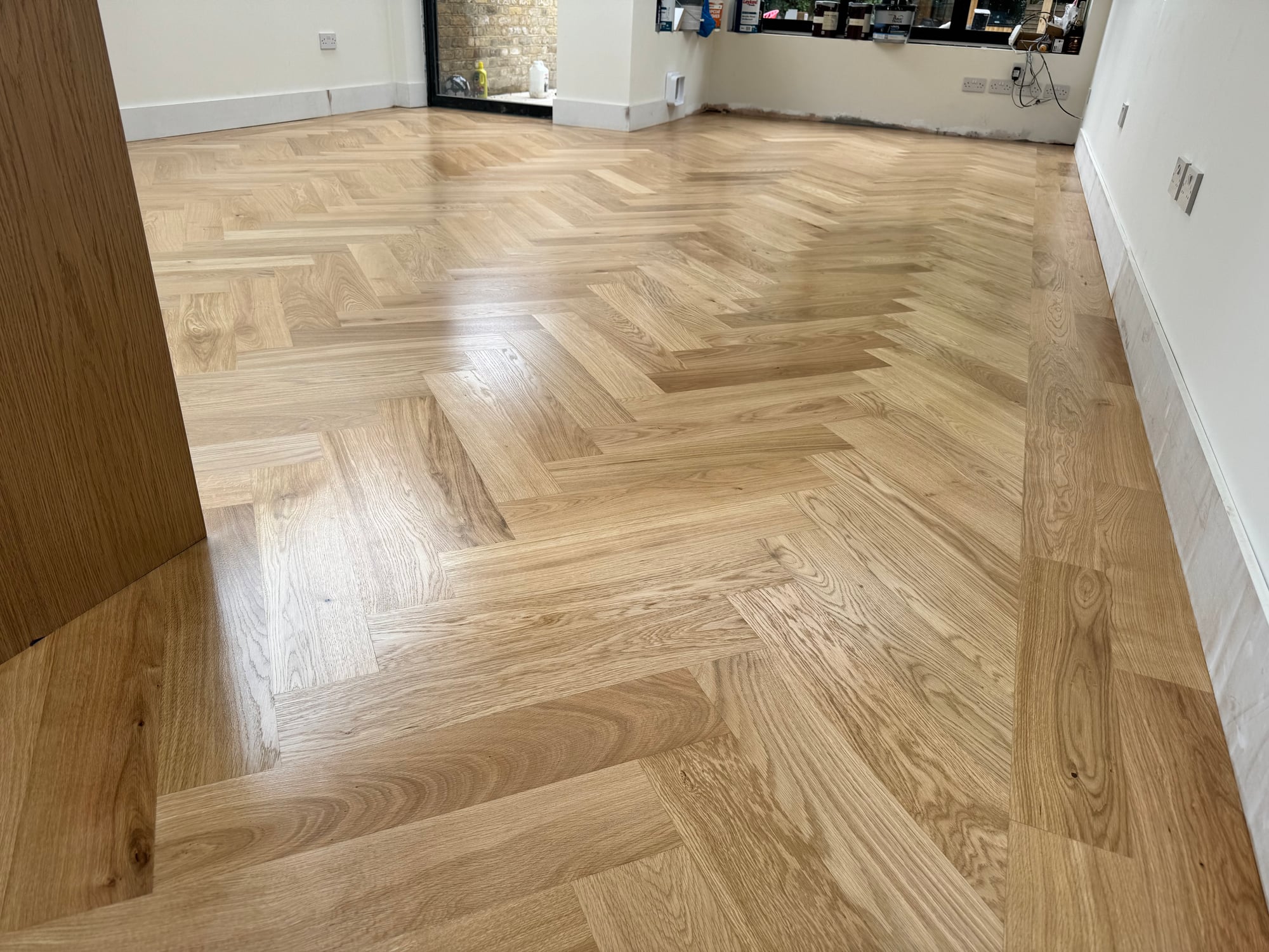 Restored herringbone parquet floor in a Hampstead townhouse