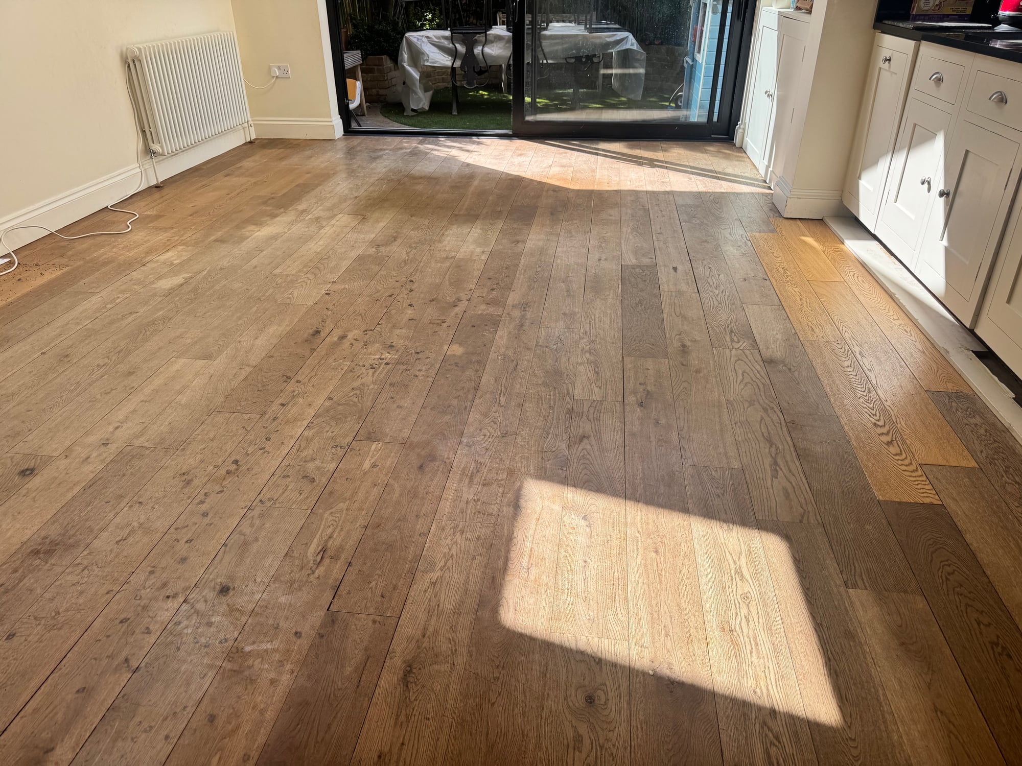 Refinished engineered oak floor in a Richmond living room